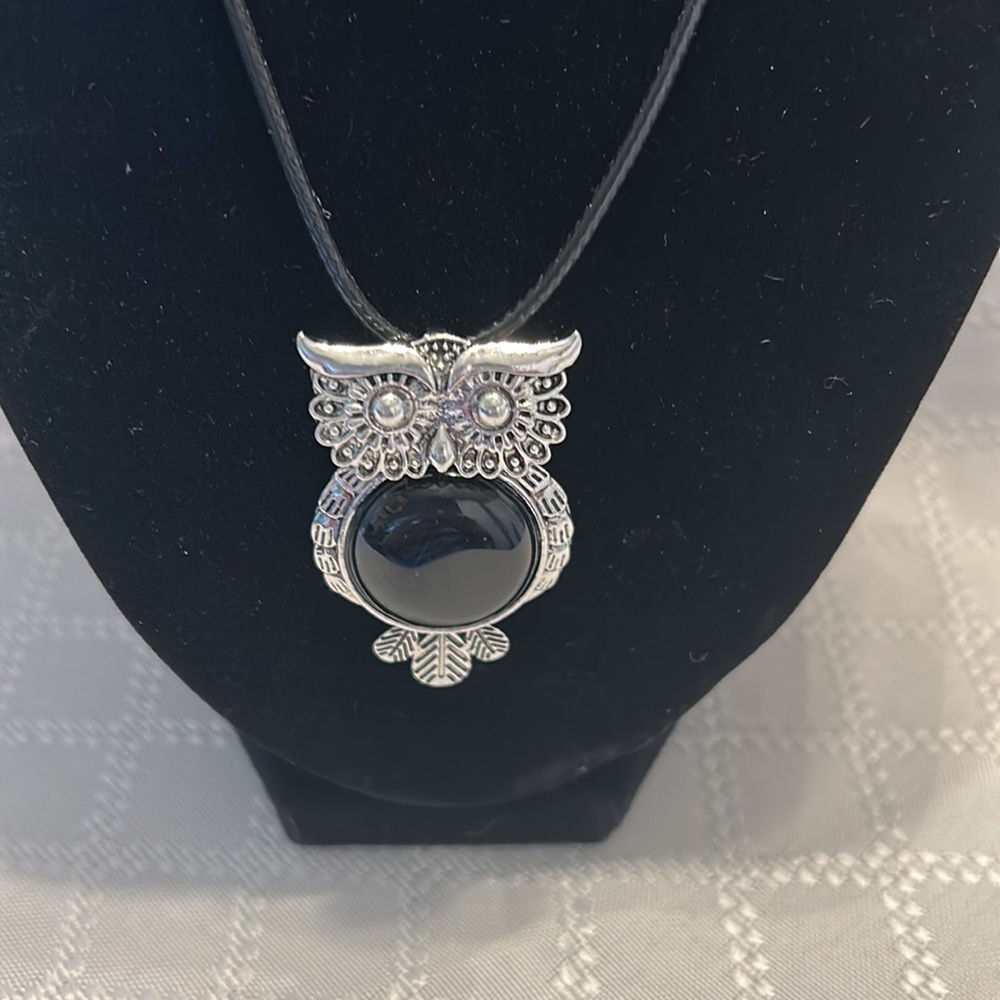 Owl necklace. Silver and black owl measures approx 2” x1”.
